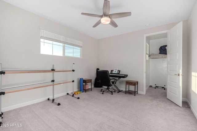 office featuring ceiling fan, baseboards, and carpet