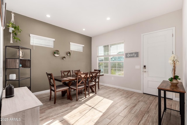 dining area featuring recessed lighting, light wood finished floors, and baseboards