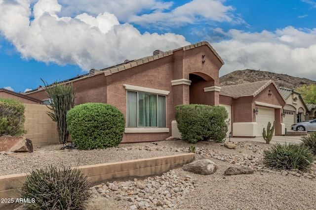 1934 W Morning Vista Ln, Phoenix, AZ 85085 - view of front of property with a mountain view, fence, a garage, and stucco siding