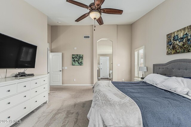 1934 W Morning Vista Ln, Phoenix, AZ 85085 - bedroom featuring ceiling fan, arched walkways, visible vents, light carpet, and baseboards