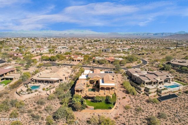 drone / aerial view with a residential view and a mountain view