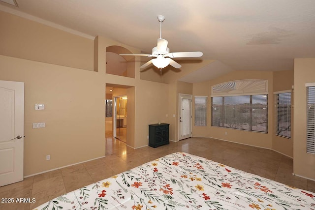 21840 N 43rd St, Phoenix, AZ 85050 - unfurnished bedroom with tile patterned floors, vaulted ceiling, and baseboards