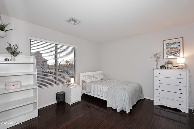 21840 N 43rd St, Phoenix, AZ 85050 - bedroom with wood finished floors, baseboards, and visible vents