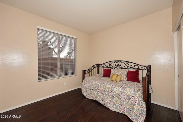 21840 N 43rd St, Phoenix, AZ 85050 - bedroom with baseboards and wood finished floors
