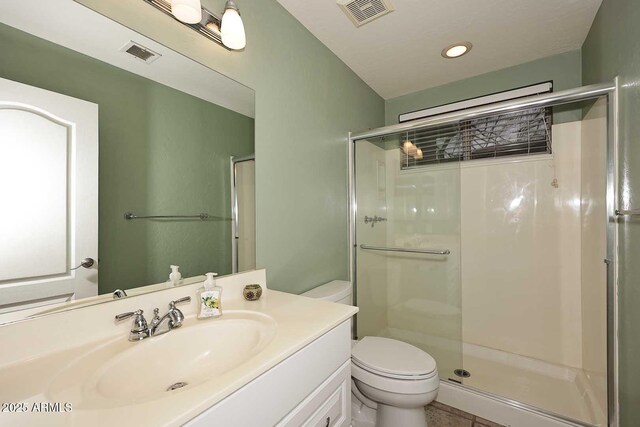 21840 N 43rd St, Phoenix, AZ 85050 - full bath with toilet, vanity, a stall shower, and visible vents