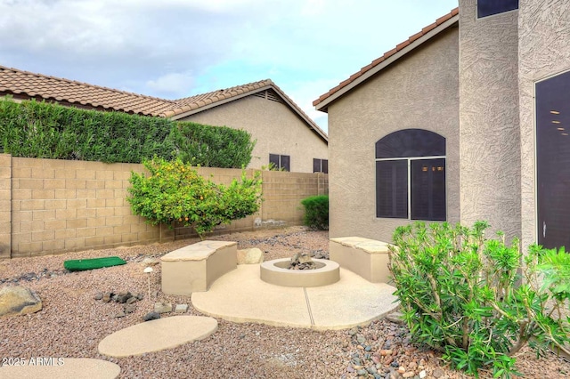 21840 N 43rd St, Phoenix, AZ 85050 - view of patio with a fire pit and a fenced backyard