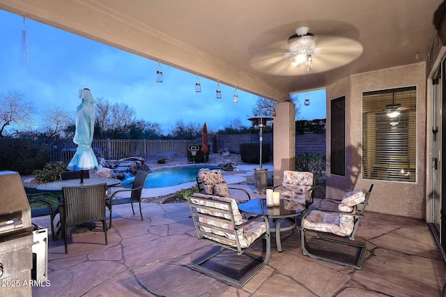 21840 N 43rd St, Phoenix, AZ 85050 - view of patio featuring a ceiling fan, a fenced backyard, a fenced in pool, and outdoor dining area