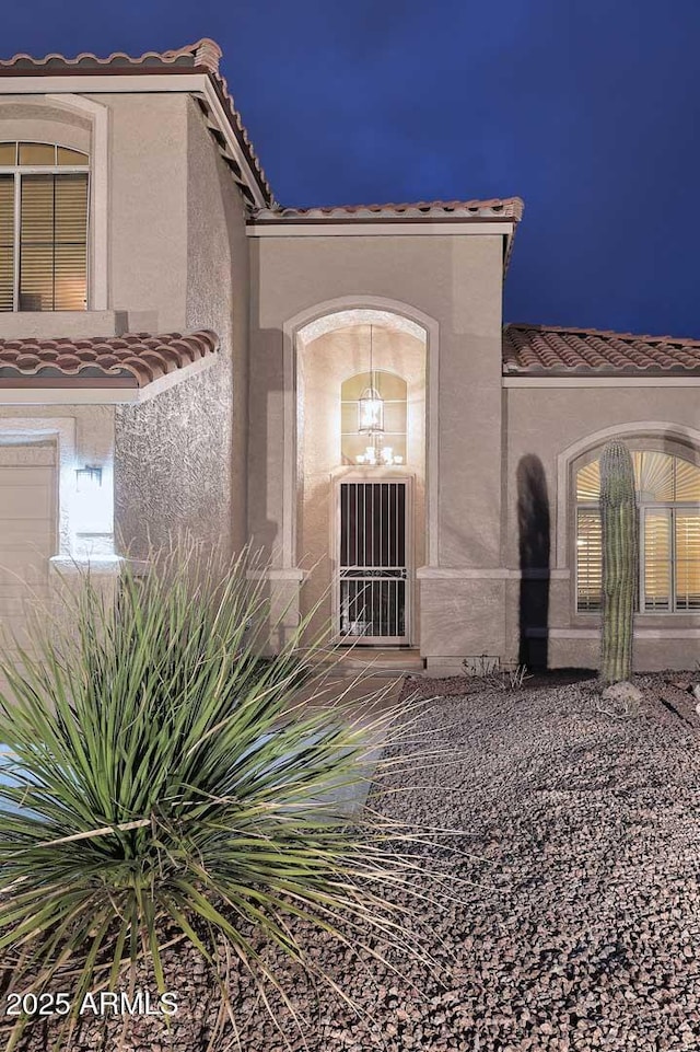 21840 N 43rd St, Phoenix, AZ 85050 - exterior space featuring stucco siding and a tiled roof