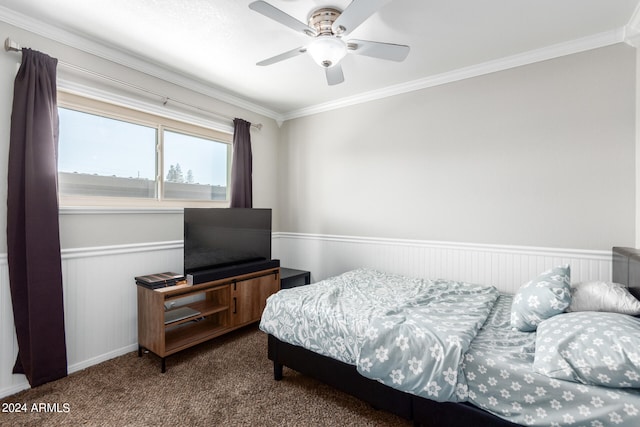 carpeted bedroom with ceiling fan and crown molding