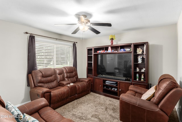 living room with carpet flooring and ceiling fan