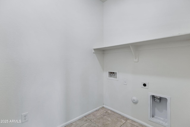 clothes washing area with light tile patterned flooring, hookup for a washing machine, hookup for an electric dryer, hookup for a gas dryer, and laundry area