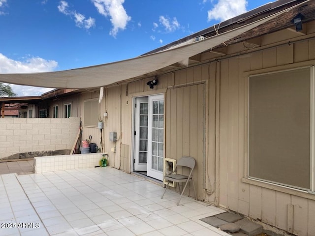 view of patio featuring fence