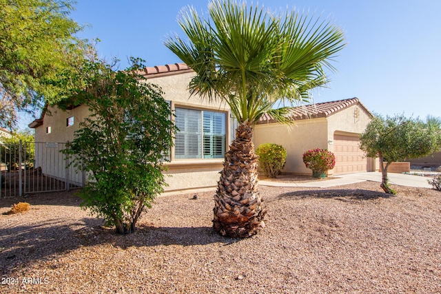 view of property exterior featuring a garage