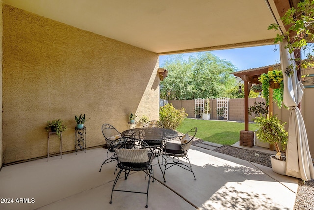 view of patio featuring a pergola