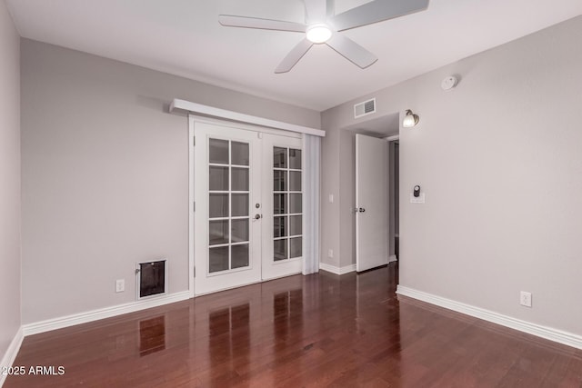 1173 E Cochise Dr, Phoenix, AZ 85020 - unfurnished room featuring french doors, wood finished floors, baseboards, ceiling fan, and a smoke detector