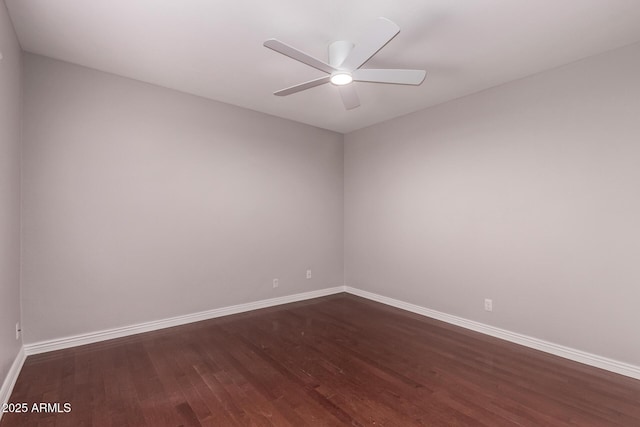 1173 E Cochise Dr, Phoenix, AZ 85020 - empty room featuring dark wood-style flooring, baseboards, and ceiling fan