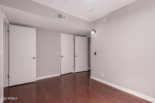 1173 E Cochise Dr, Phoenix, AZ 85020 - unfurnished bedroom featuring wood finished floors and baseboards