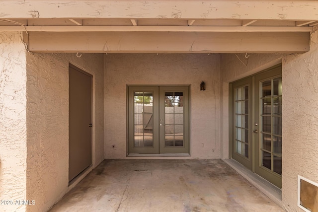 1173 E Cochise Dr, Phoenix, AZ 85020 - doorway to property with french doors, a patio, and stucco siding