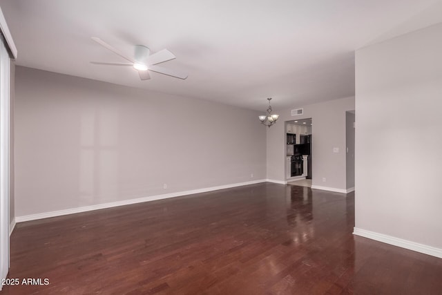 1173 E Cochise Dr, Phoenix, AZ 85020 - unfurnished living room with a chandelier, wood finished floors, ceiling fan, and baseboards