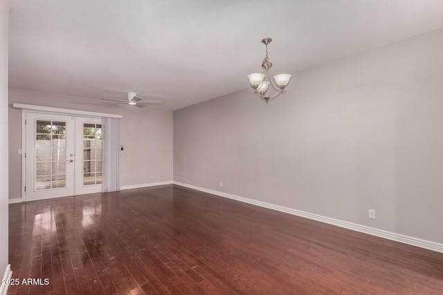 1173 E Cochise Dr, Phoenix, AZ 85020 - empty room featuring dark wood-style flooring, french doors, a chandelier, and baseboards