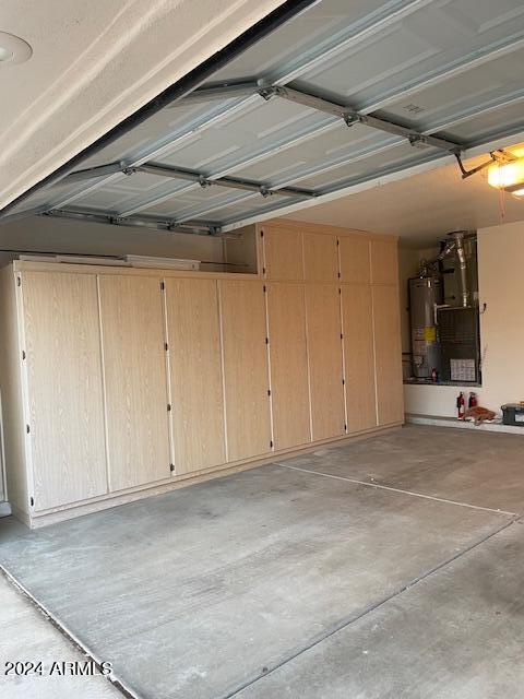 garage featuring water heater