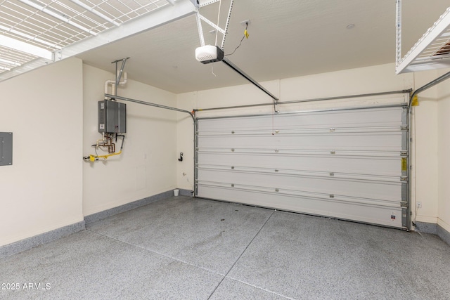 garage featuring a garage door opener, electric panel, and water heater