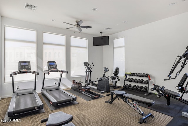 workout area with ceiling fan