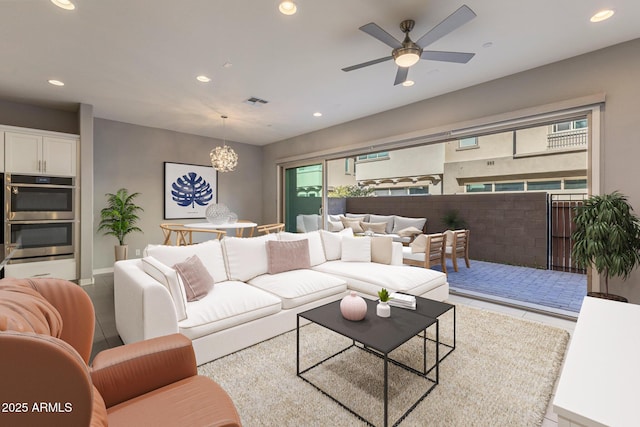 living room with light tile patterned floors and ceiling fan