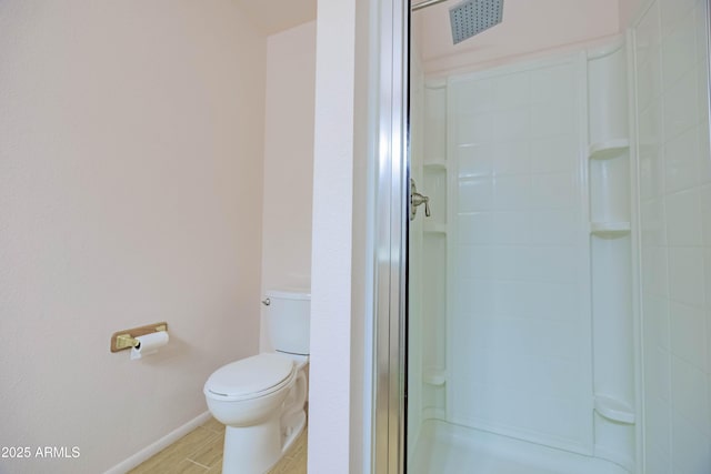 1726 W Claremont St, Phoenix, AZ 85015 - full bath with a stall shower, toilet, and baseboards
