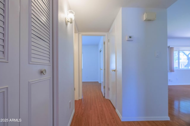 1726 W Claremont St, Phoenix, AZ 85015 - hallway with wood finished floors and baseboards