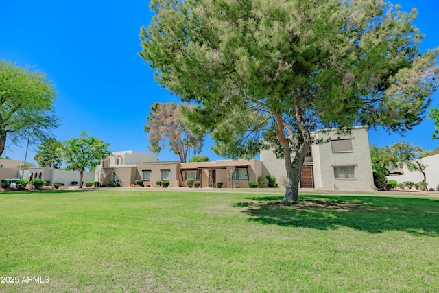 1726 W Claremont St, Phoenix, AZ 85015 - view of front facade featuring a front yard and stucco siding