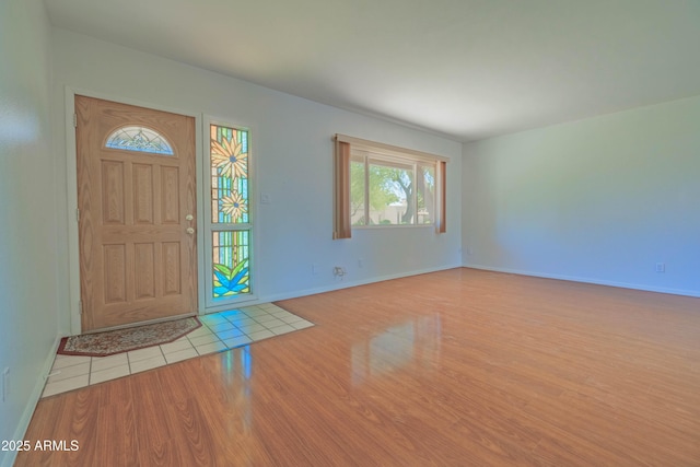 1726 W Claremont St, Phoenix, AZ 85015 - entryway with wood finished floors and baseboards
