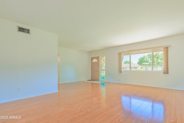 1726 W Claremont St, Phoenix, AZ 85015 - unfurnished room with baseboards and wood finished floors