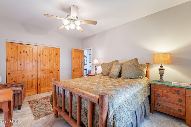 bedroom with ceiling fan and a closet