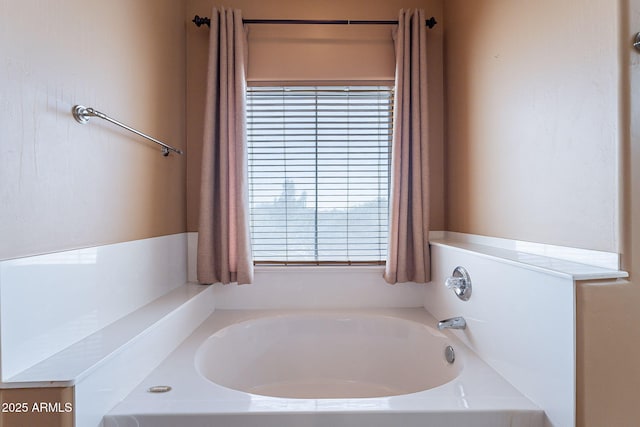 bathroom with a tub