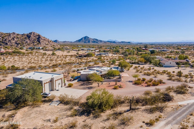 drone / aerial view featuring a mountain view