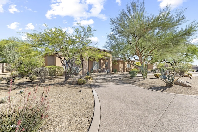 view of front of home featuring stucco siding