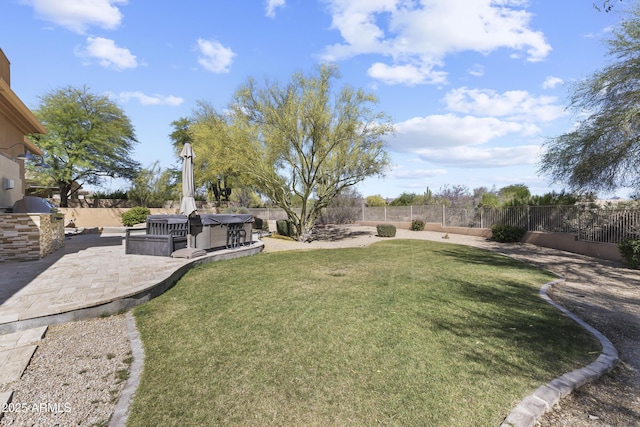 view of yard featuring area for grilling and a patio area