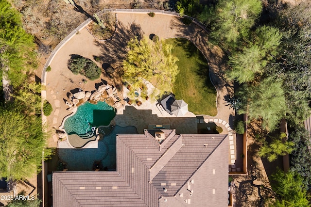 view of subject property featuring a pool