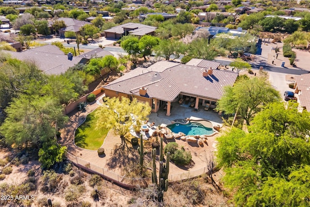 view of subject property with a pool area