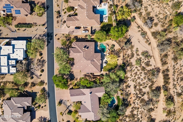 aerial perspective of suburban area with a pool area