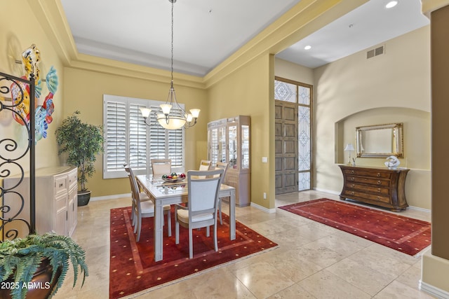 dining room featuring a chandelier, baseboards, light tile patterned floors, and recessed lighting