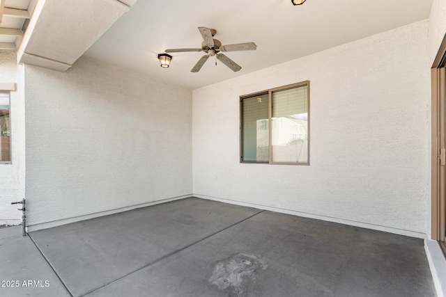 view of patio featuring ceiling fan