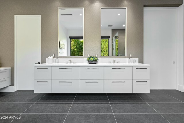 6862 E Joshua Tree Ln, Paradise Valley, AZ 85253 - bathroom with double vanity and tile patterned floors