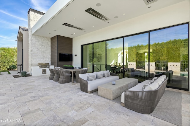 6862 E Joshua Tree Ln, Paradise Valley, AZ 85253 - view of patio with an outdoor living space and outdoor dining area