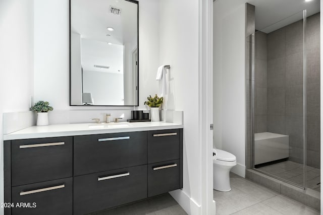 bathroom with walk in shower, tile patterned flooring, vanity, and toilet