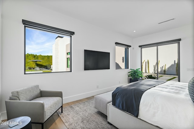 bedroom featuring wood-type flooring