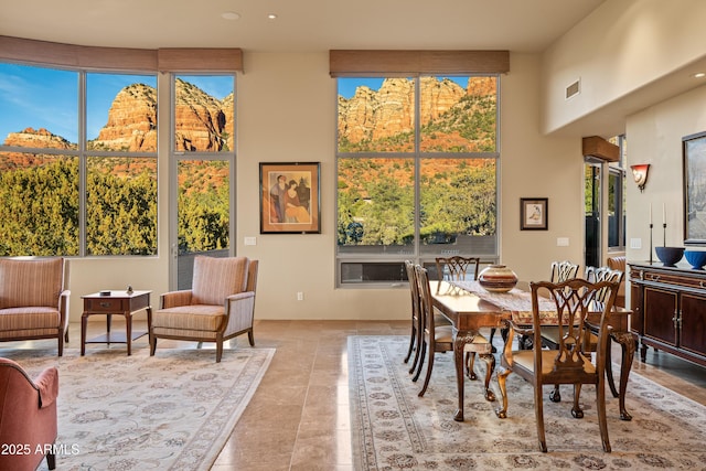 dining space with visible vents and recessed lighting