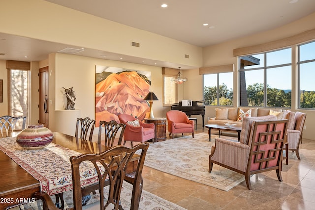 dining space featuring visible vents, a wealth of natural light, and recessed lighting