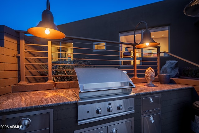 view of patio with an outdoor kitchen and area for grilling